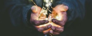 image of a person holding a lightbulb upside down for Pennsylvania Personal Insurance