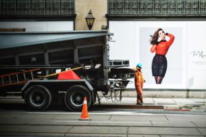 image of a road work truck and an employee wearing safety gear for Pennsylvania Risk Assessments Businesses