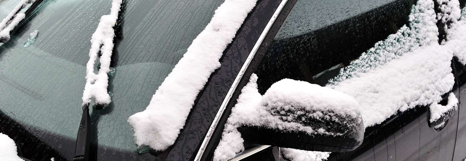 Vehicle covered in snow